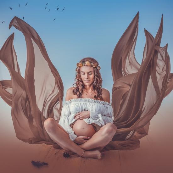 Photo de grossesse avec envolées